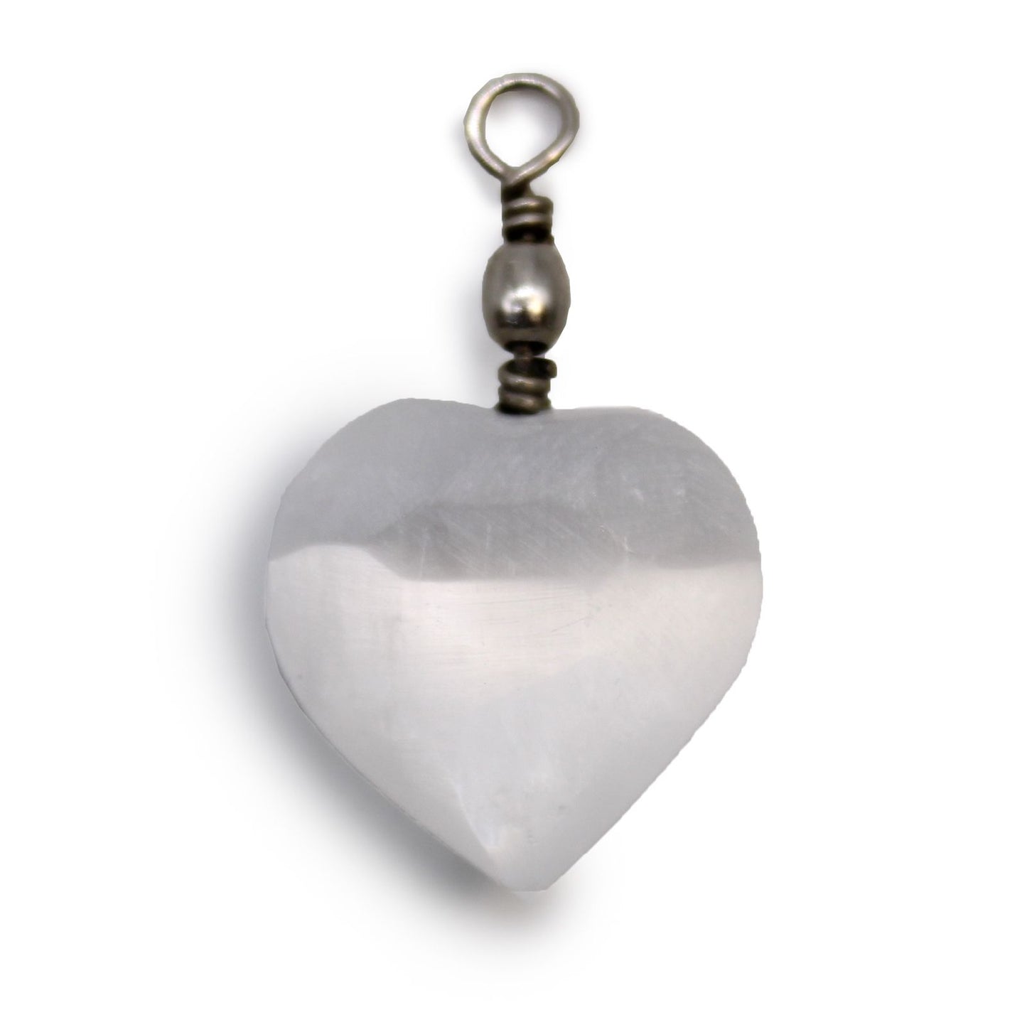 A polished white translucent selenite crystal carved into a heart shape and hanging as a jewellery pendant.