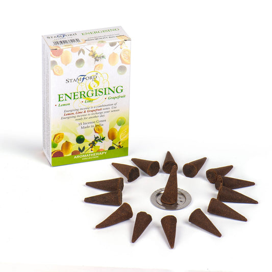 A pile of dark grey premium incense cones showing a smooth texture and uniform conical shape.