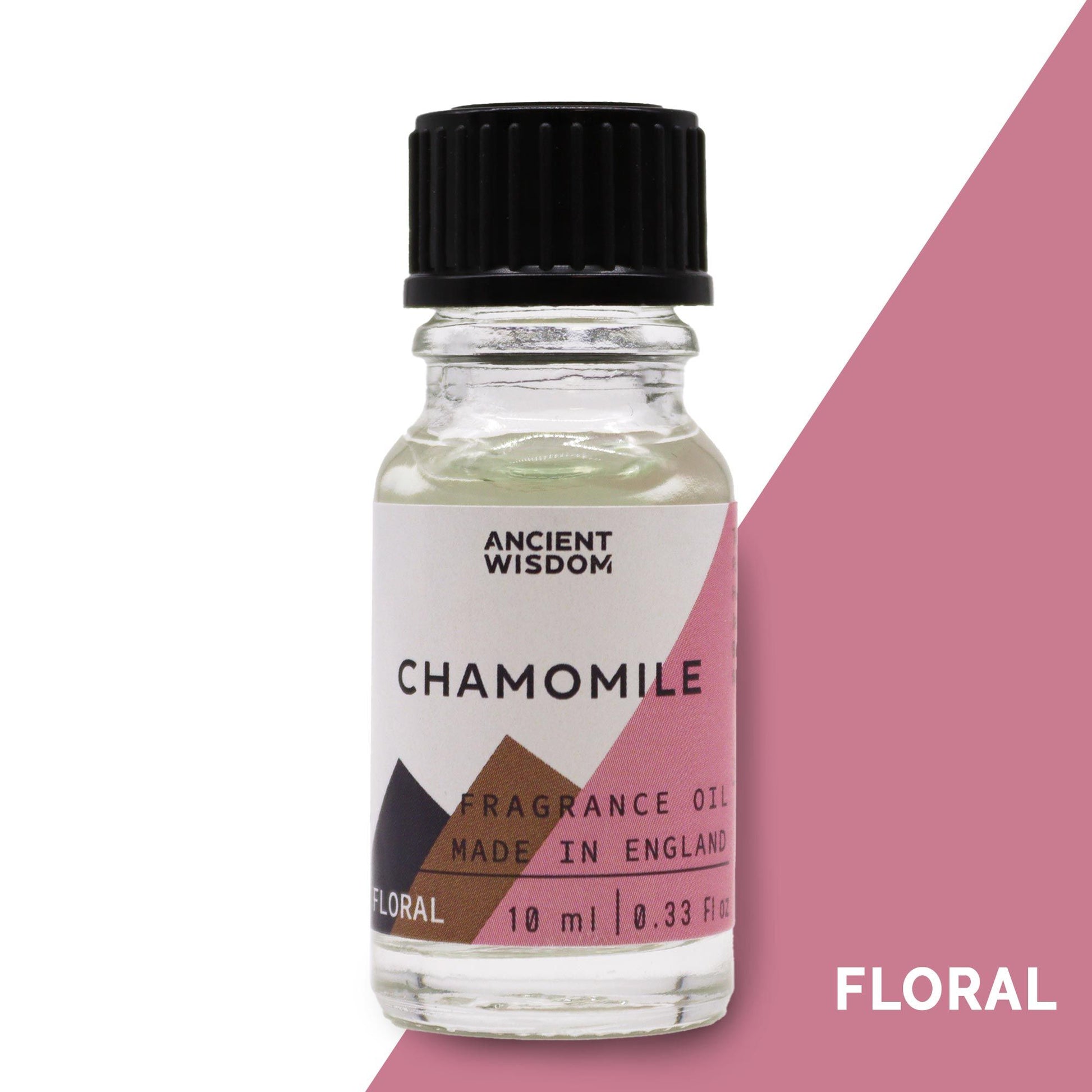 Small amber glass bottle of chamomile fragrance oil with a white label on a neutral background.
