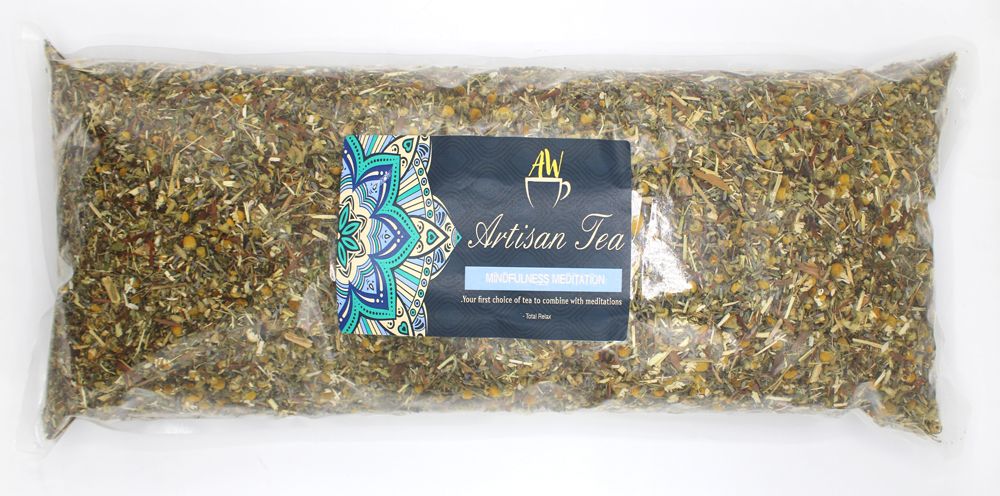 Dried camomile flower heads mixed with lavender and lemon notes for a relaxing herbal tea infusion.