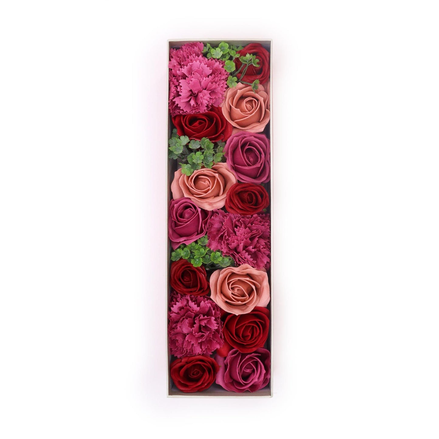 Elegant long gift box filled with realistic pink soap roses arranged in a decorative row.