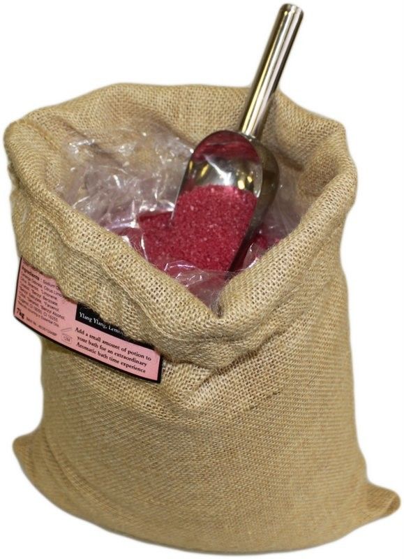 Large rustic hessian sack filled with pink aromatherapy bath salts.