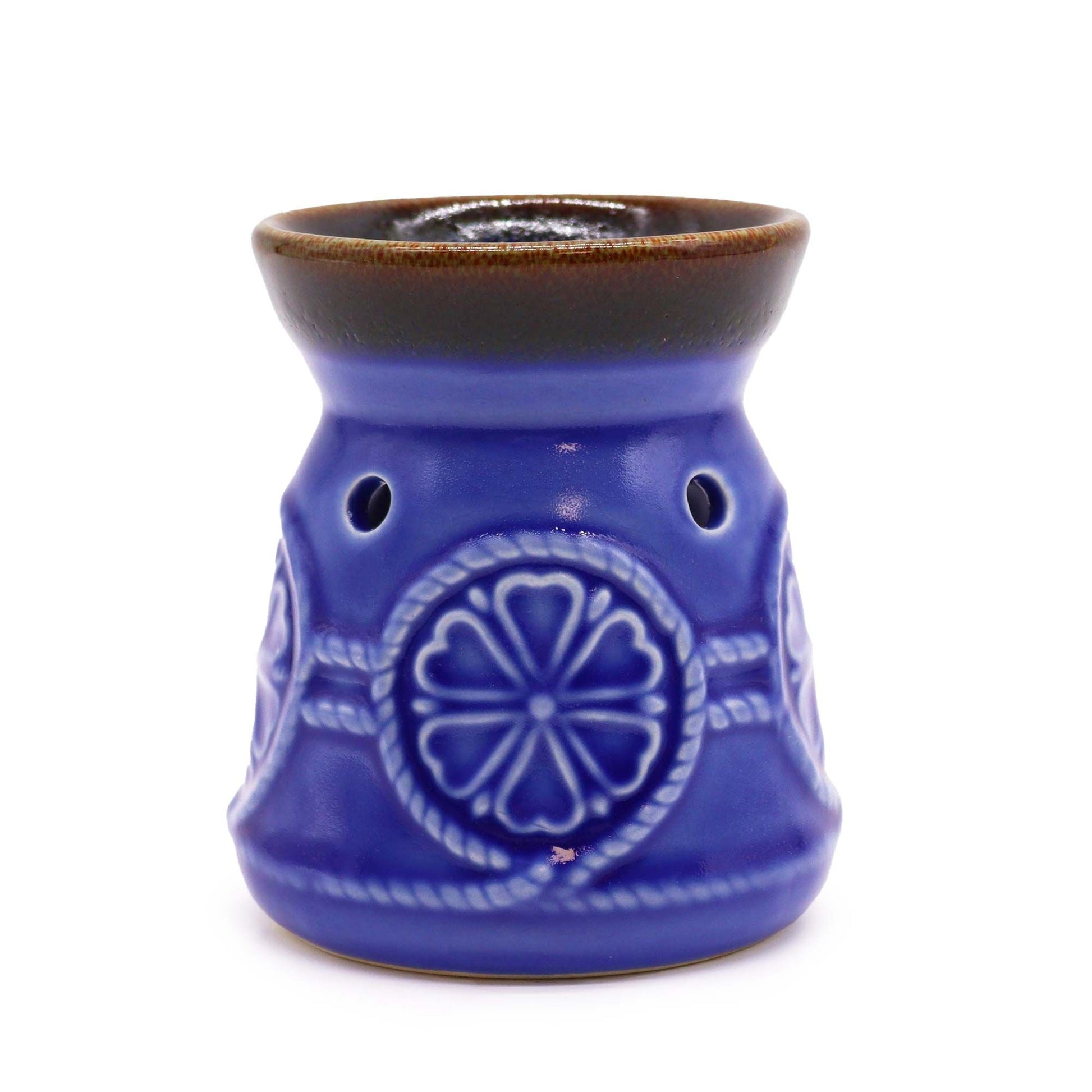 Elegant blue ceramic oil burner with a classic spa-style design for aromatherapy and home fragrance.