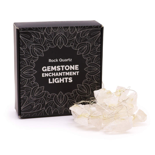 String of twenty natural clear rock quartz crystal gemstones illuminated by warm white LED lights.