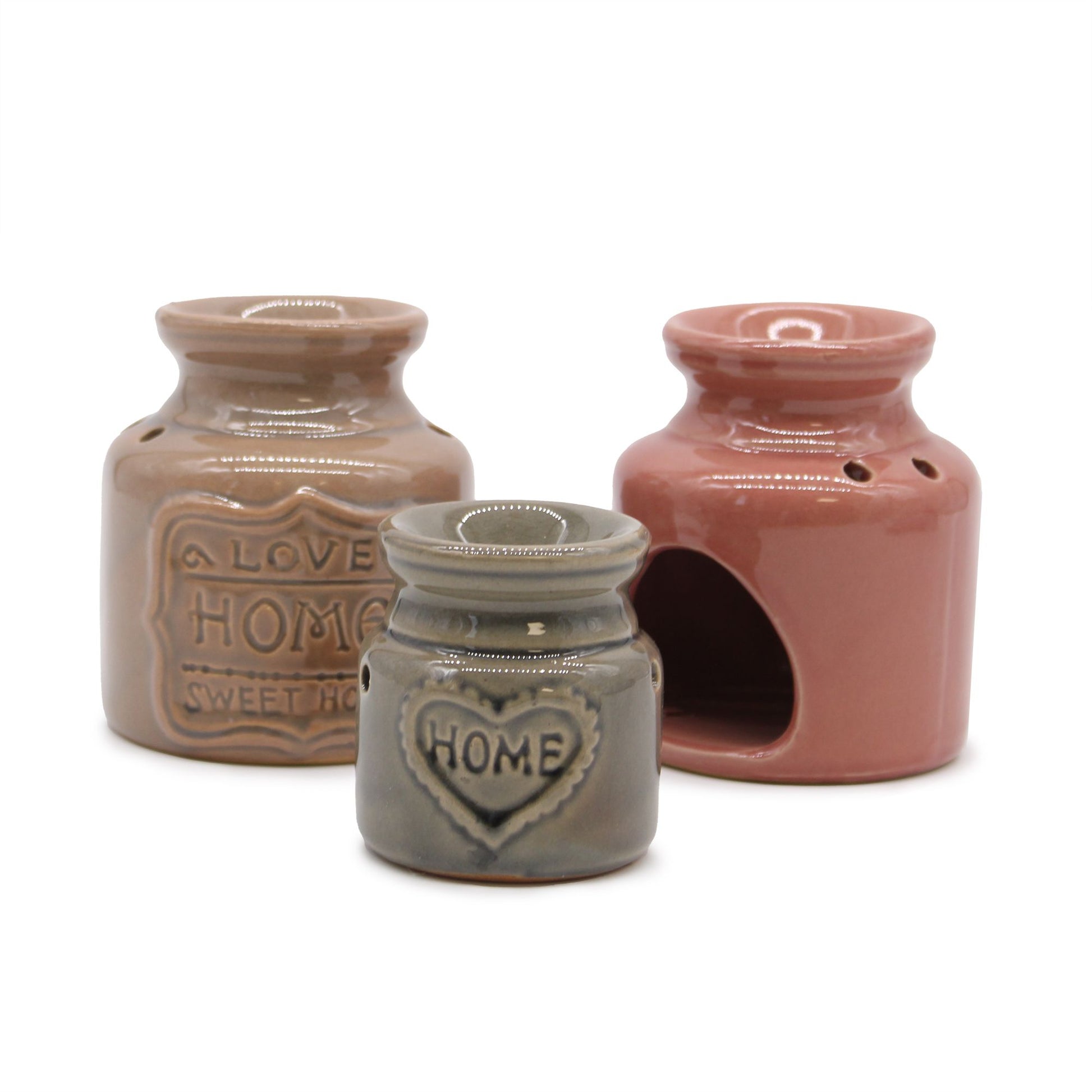 Elegant white ceramic oil burner featuring a colourful Love Home Sweet Home house design with a glazed finish.
