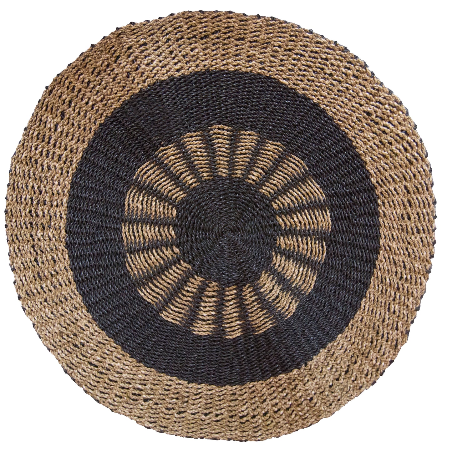 Round seagrass rug with a black and tan inner sun pattern design on a natural woven background.