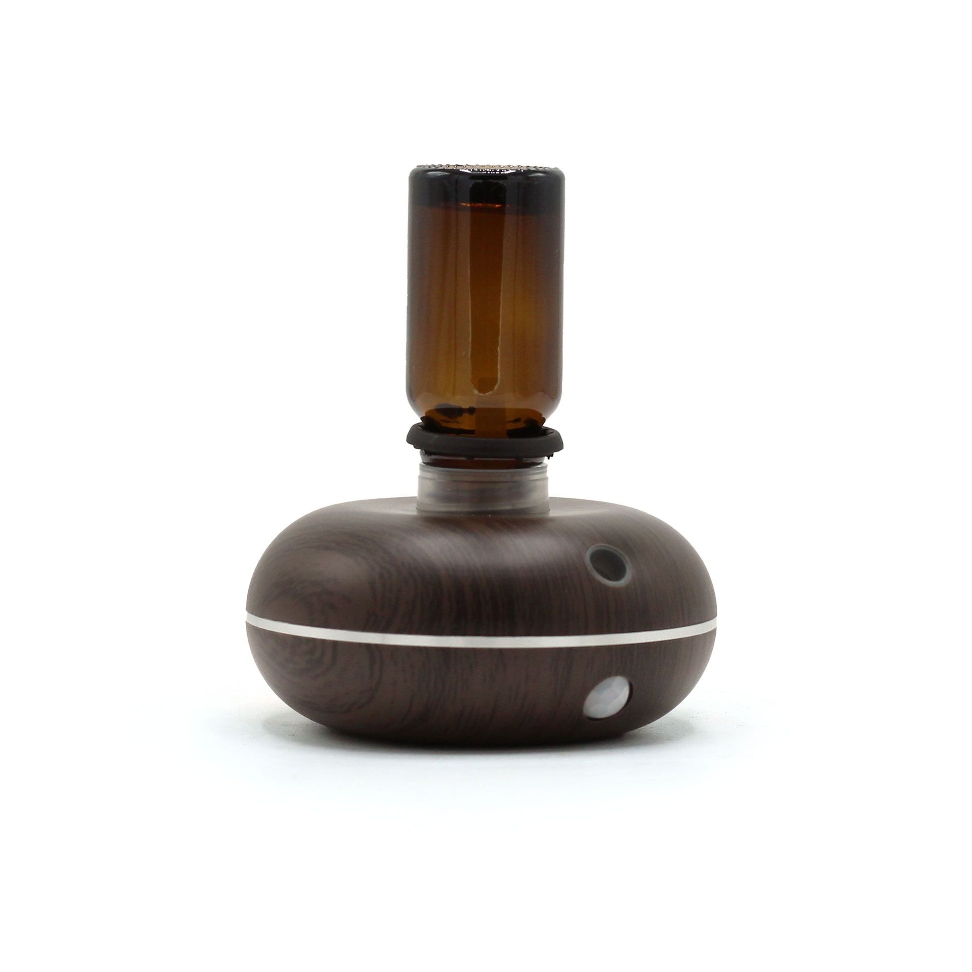 Compact black waterless essential oil nebulizer with a modern minimalist design and USB-C port.