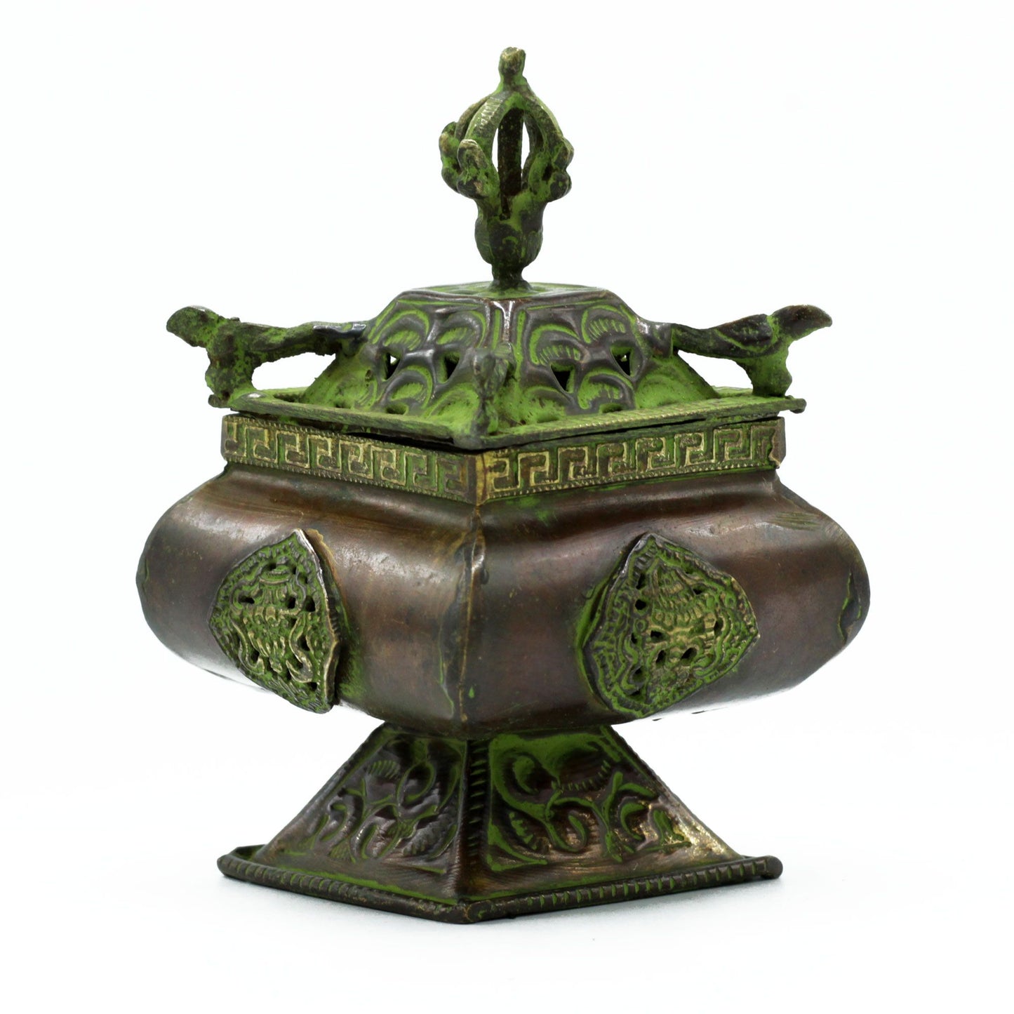 Ornate brass square standing incense burner with a green verdigris finish and embossed traditional symbols.