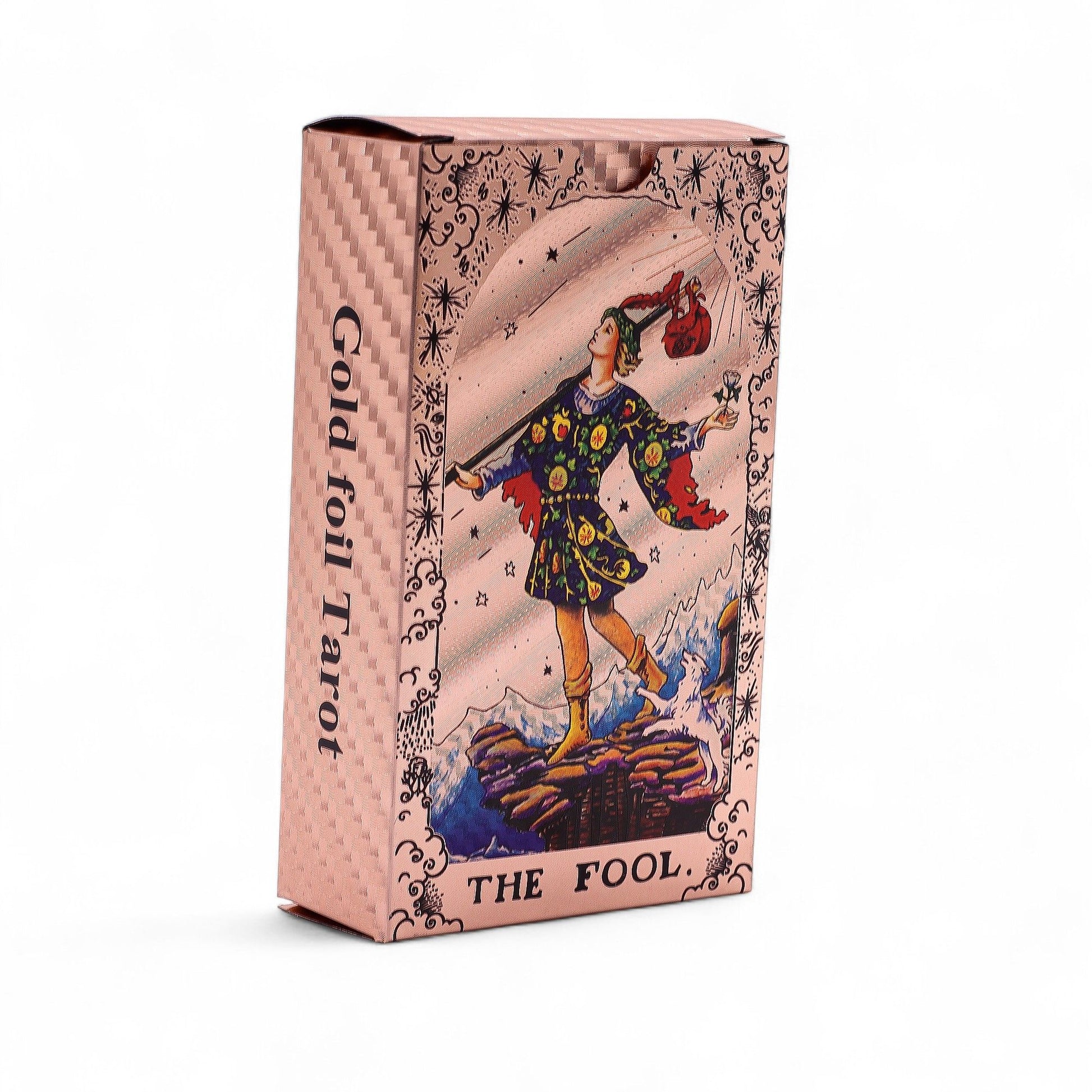 Luxurious rose gold foil tarot cards featuring intricate moon phase designs and celestial patterns on a dark background.