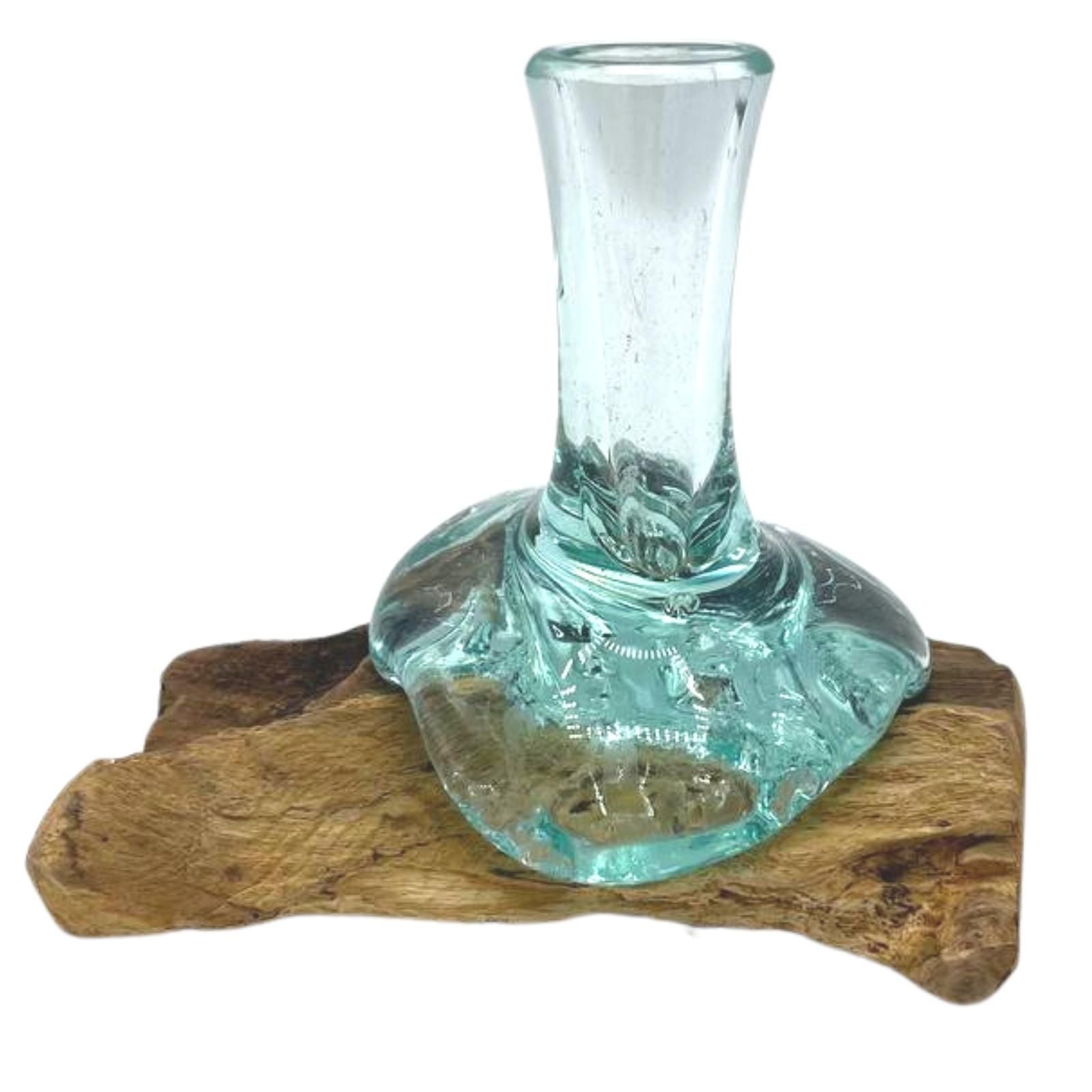 Hand-blown molten glass vase uniquely shaped to fit onto a natural gamal wood base.
