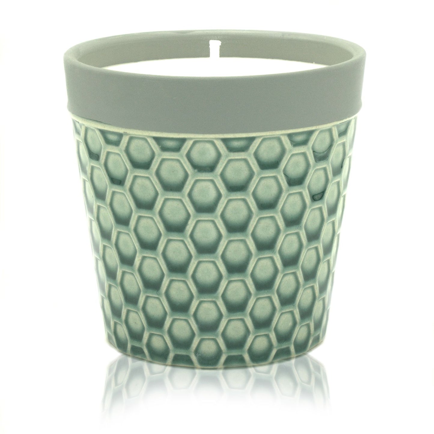 Large rustic ceramic candle pot filled with white soy wax and a single wick.