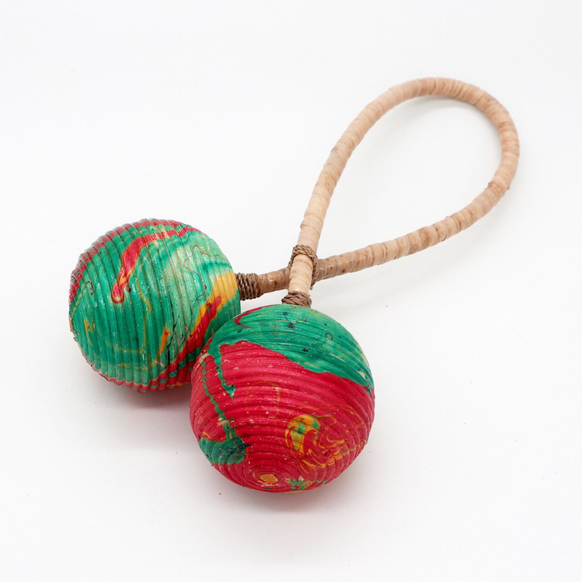 Handcrafted rattan maraca rattle featuring a unique double-twist design and natural woven texture.