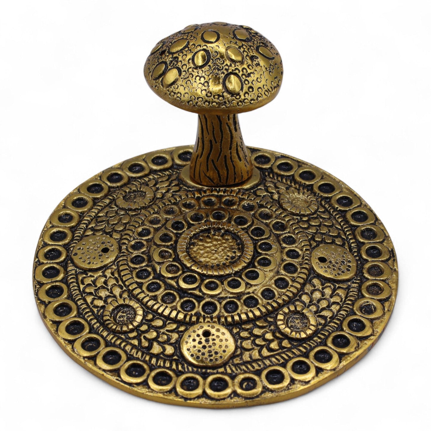 Detailed brass-effect aluminium incense plate featuring an embossed mushroom design and central stem for holding sticks.