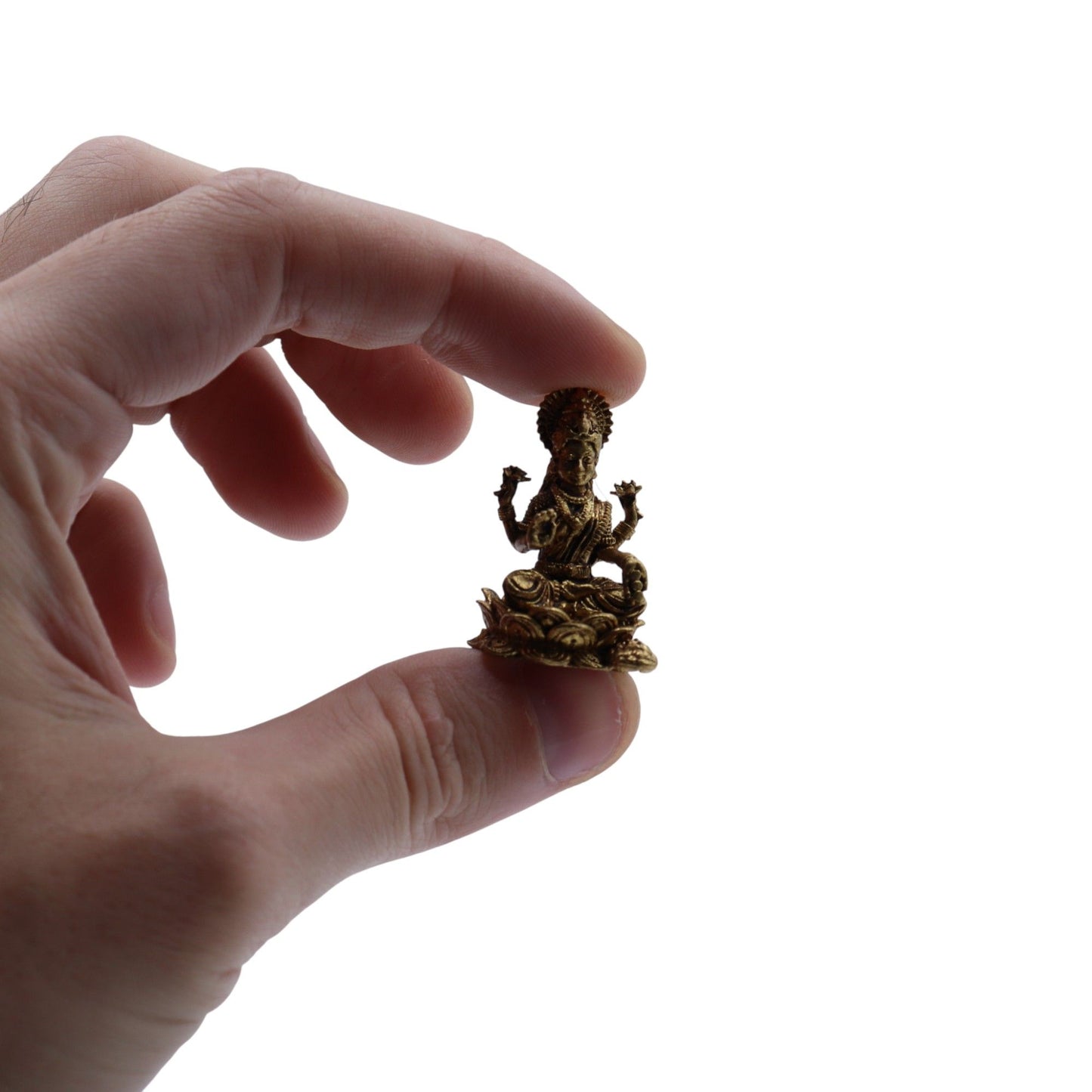 Finely detailed miniature brass figurine of Goddess Laxmi seated on a lotus flower base.