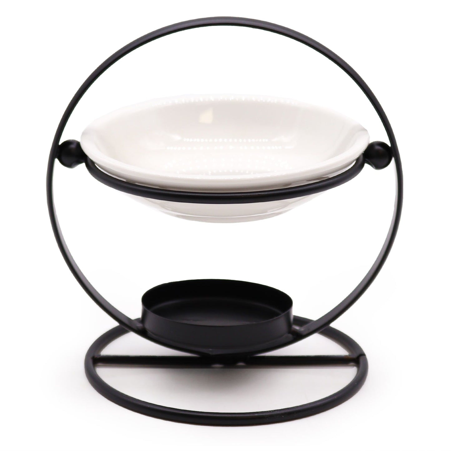 Minimalist round ceramic oil burner bowl resting on a sleek black metal geometric stand.