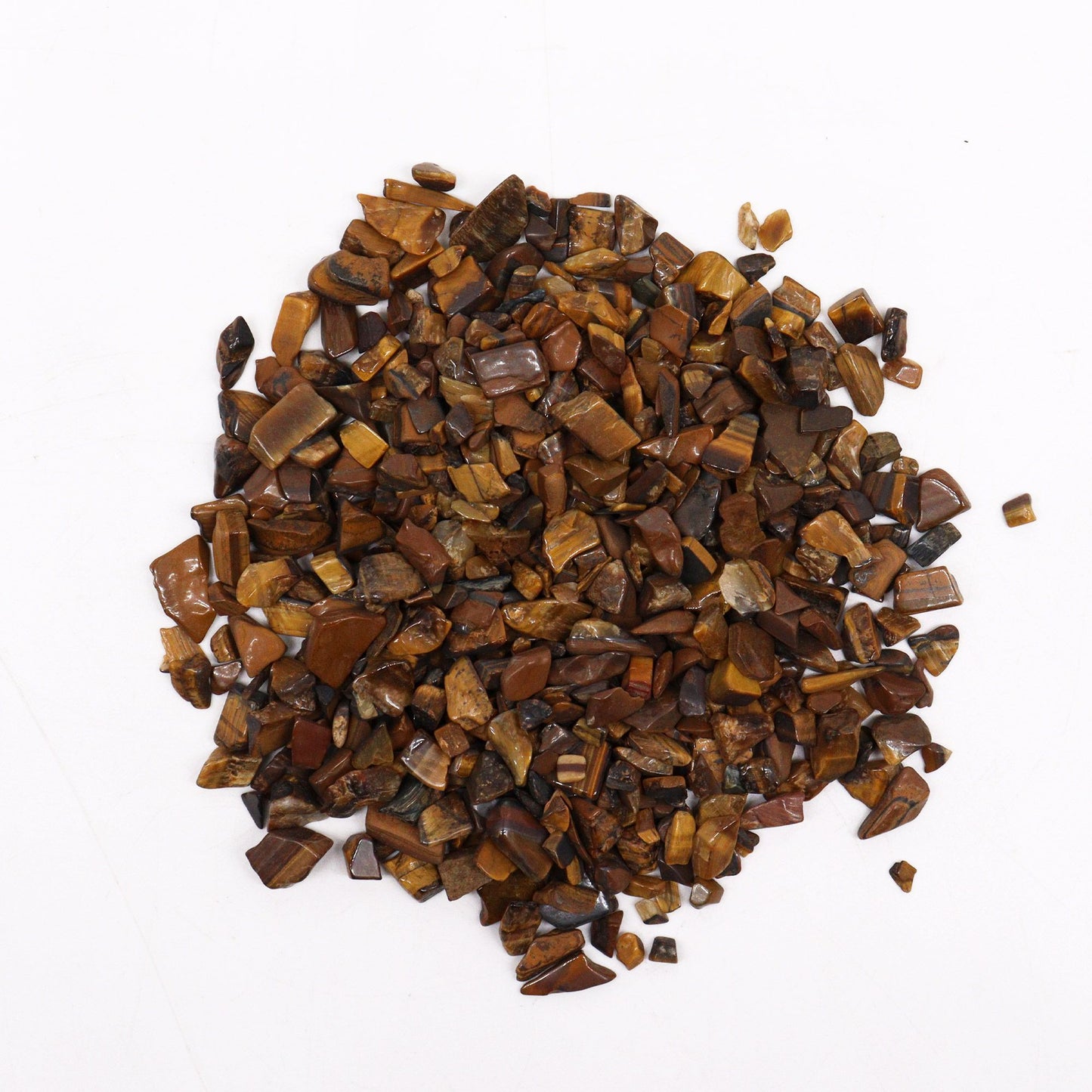 Large bag of polished golden-brown and black banded Tiger Eye gemstone chips for crafts and spiritual use.