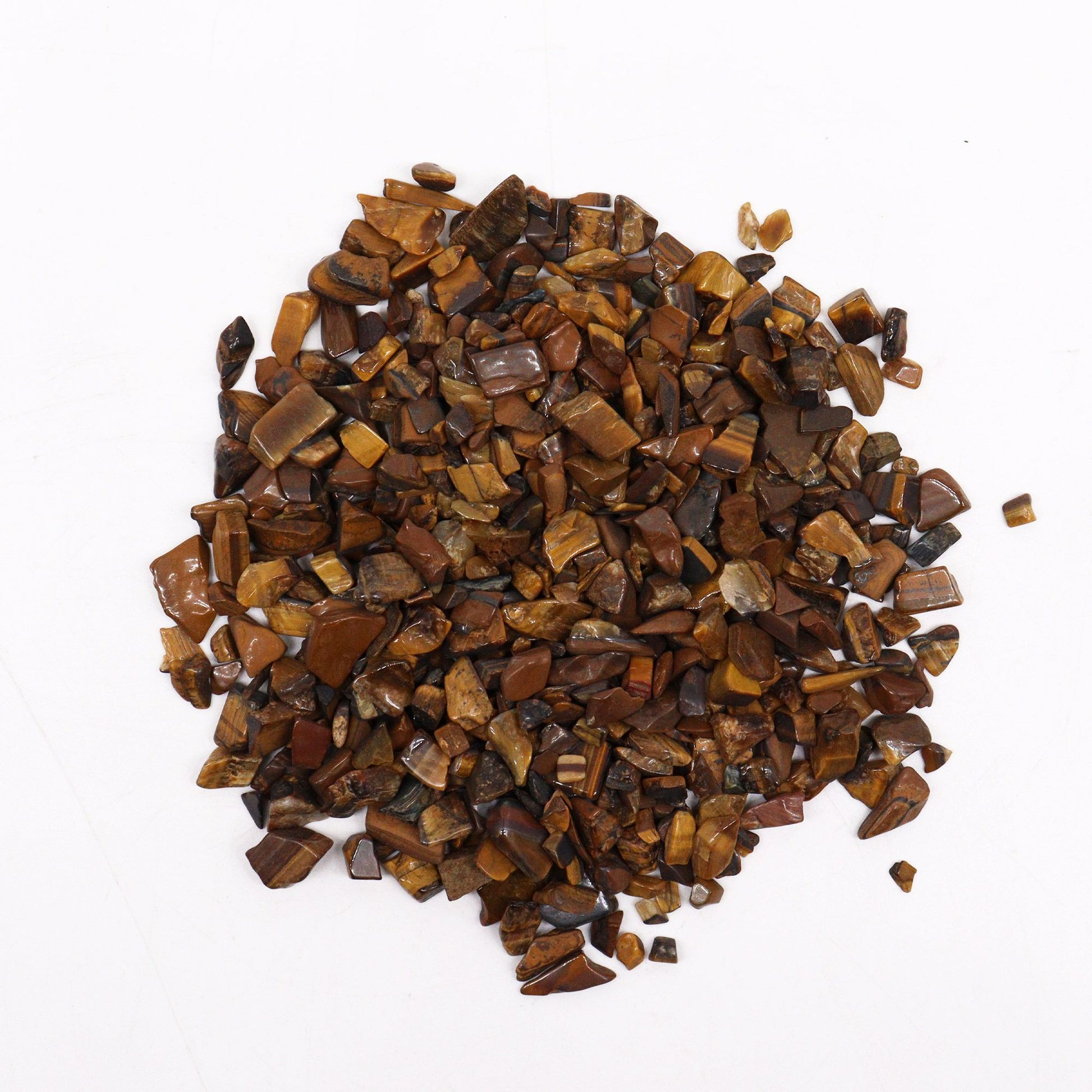 Large bag of polished golden-brown and black banded Tiger Eye gemstone chips for crafts and spiritual use.