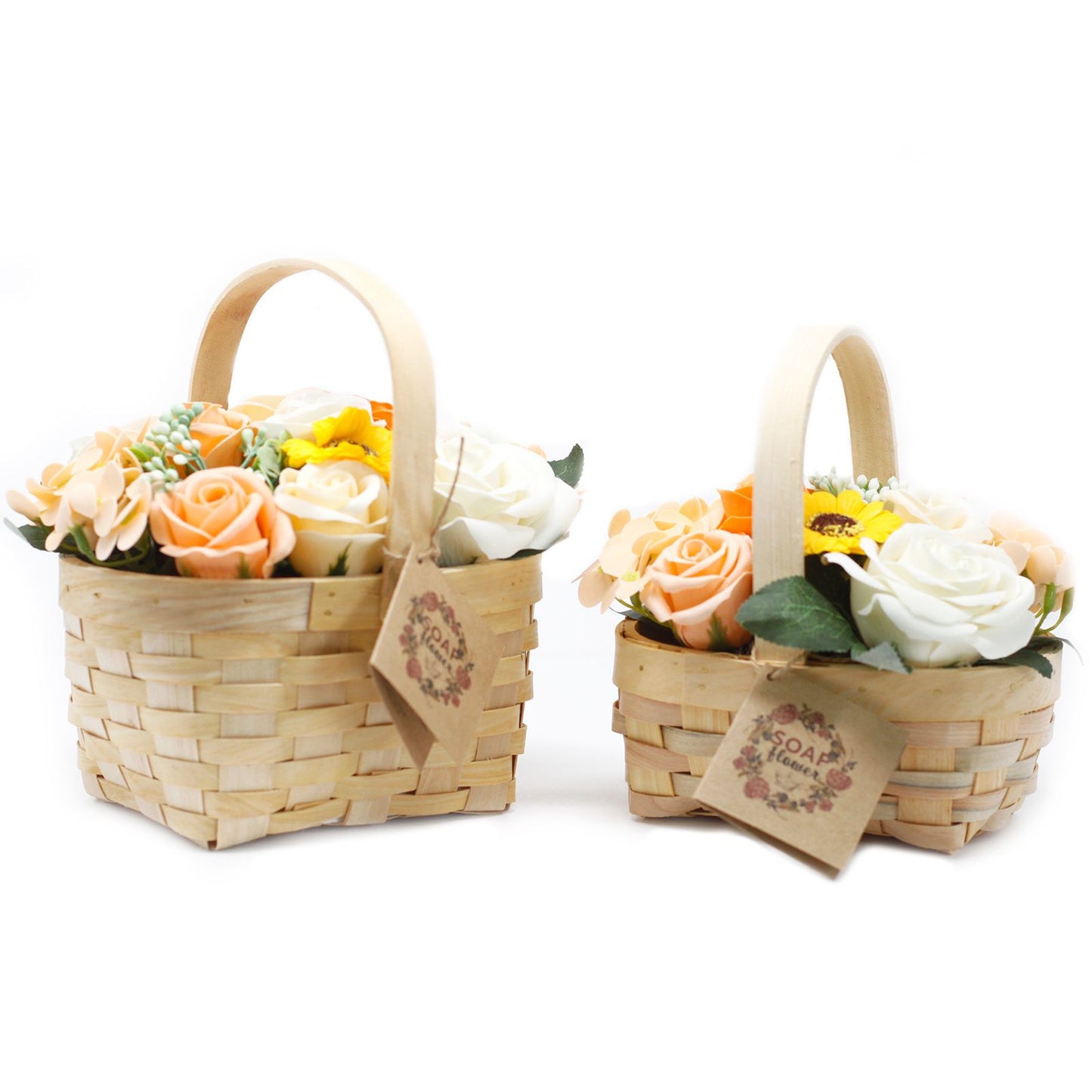 Realistic orange soap flower bouquet arranged in a rustic wicker basket with green foliage accents.