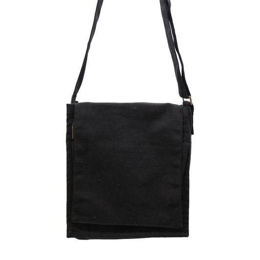 Front view of a minimalist black cotton canvas messenger bag with a long shoulder strap.