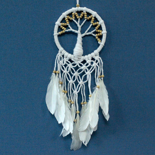 Intricate white macrame dreamcatcher featuring a woven Tree of Life design with flowing cotton tassels.