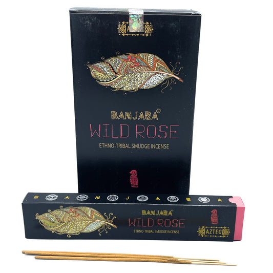 Hand-rolled smudge incense sticks in decorative tribal-inspired packaging featuring a pink wild rose design.