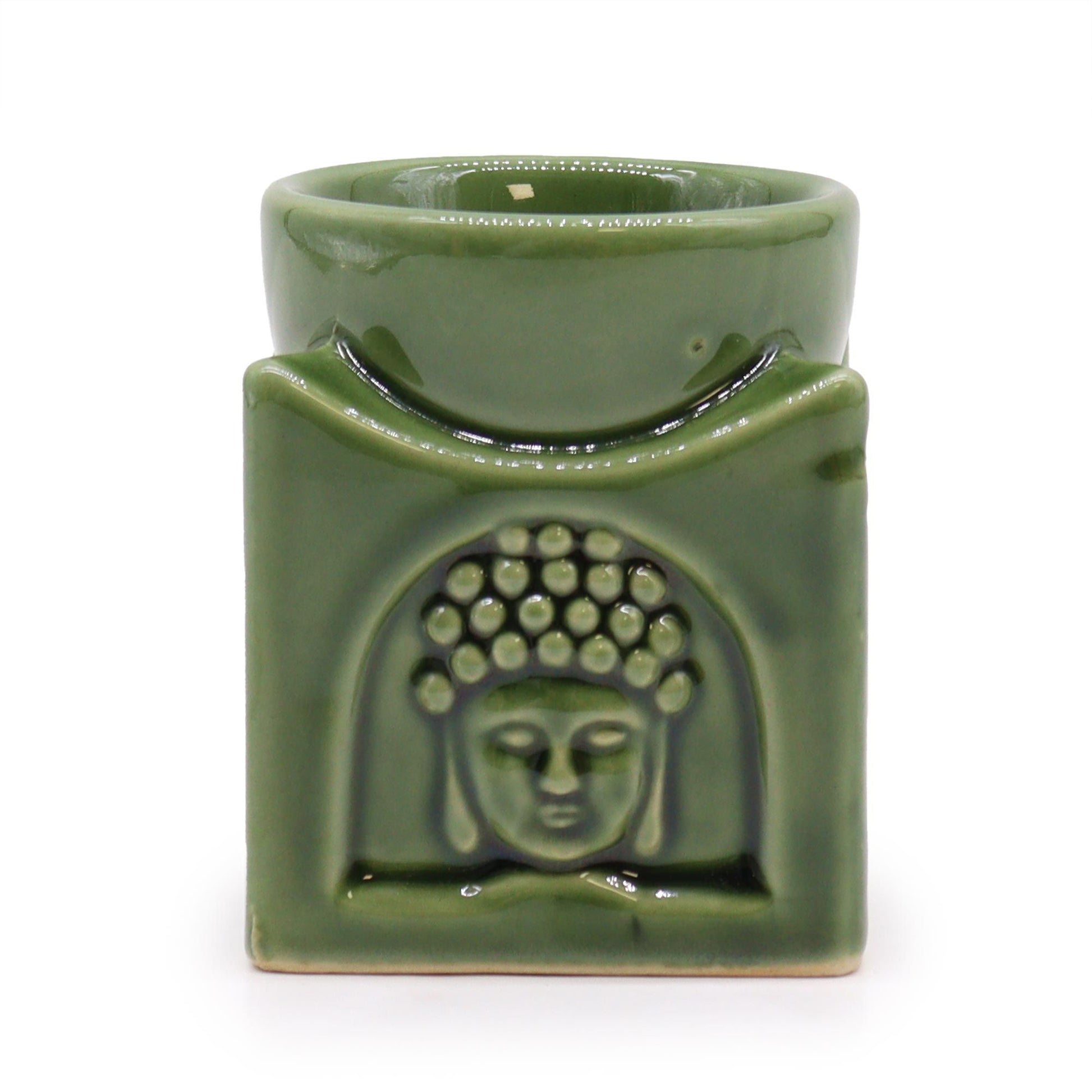 Square ceramic oil burner in a deep dark jade green finish featuring a serene carved Buddha face design.