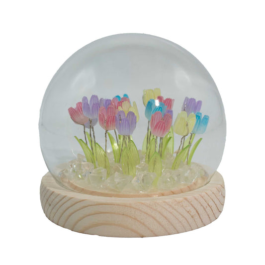 Clear glass garden dome featuring twenty colourful artificial tulips illuminated by soft integrated LED lights.
