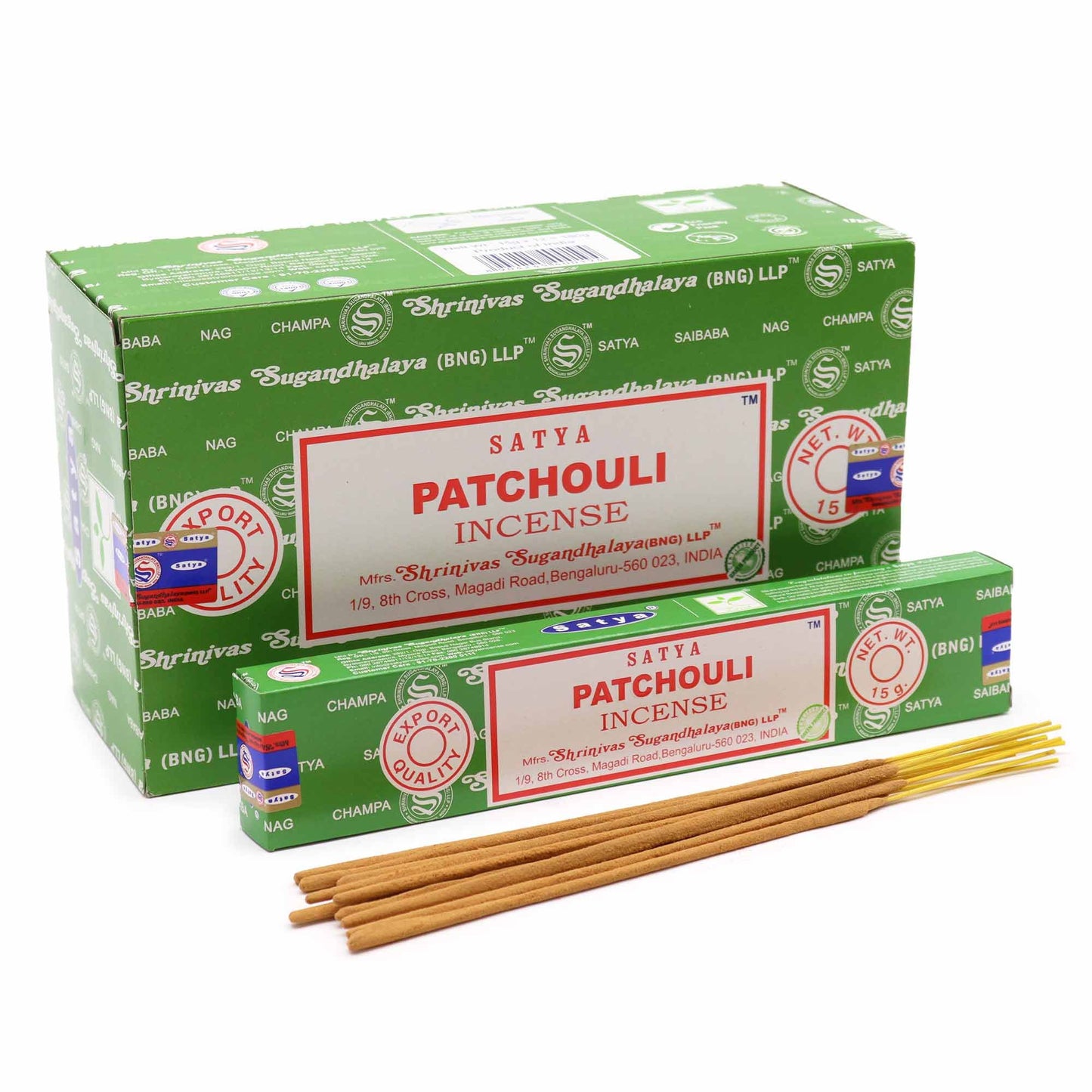 Hand-rolled patchouli incense sticks releasing a thin trail of smoke in a serene home setting.