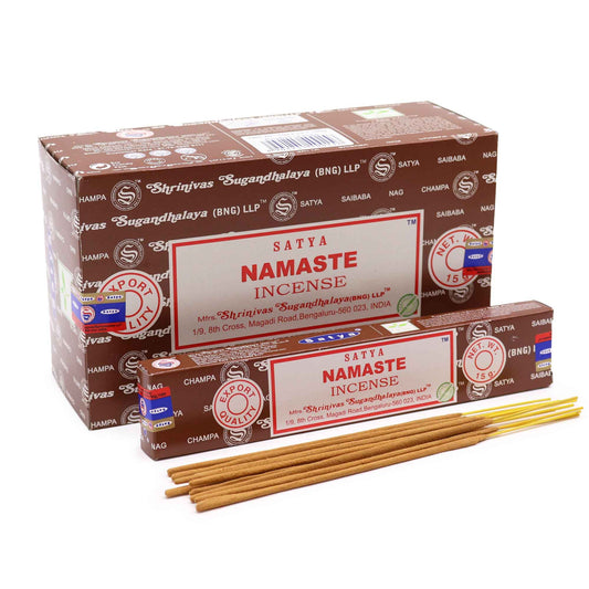 Hand-rolled incense sticks in a Namaste themed box with traditional patterns and a calming aesthetic.