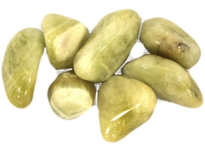 Large polished prasiolite tumble stone showing translucent pale green hues and a smooth glossy finish.