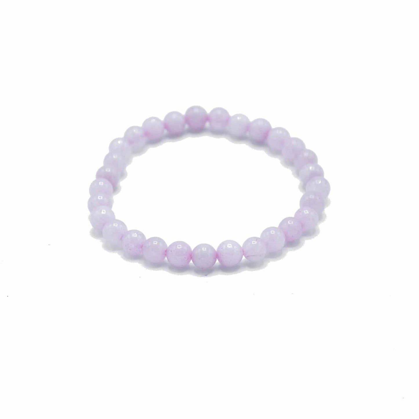 Delicate elasticated bracelet featuring polished pale pink rose quartz gemstone beads.