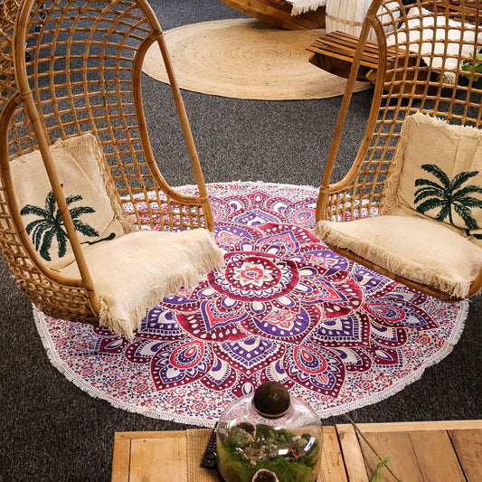 Large circular cotton wall hanging featuring an intricate mandala design in vibrant pink and purple tones.