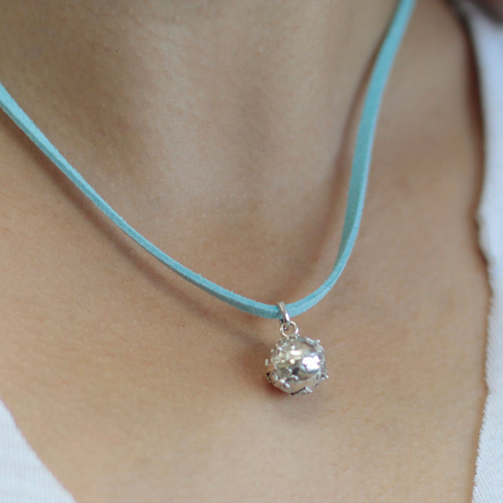 Intricate 12mm 925 sterling silver angel bell pendant with a delicate decorative design and small loop for a chain.