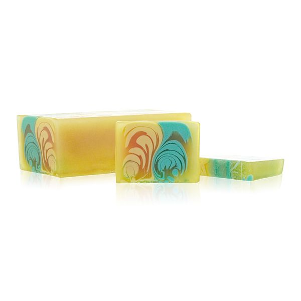 Large artisanal handcrafted soap loaf with a vibrant melon-inspired green and orange textured design.