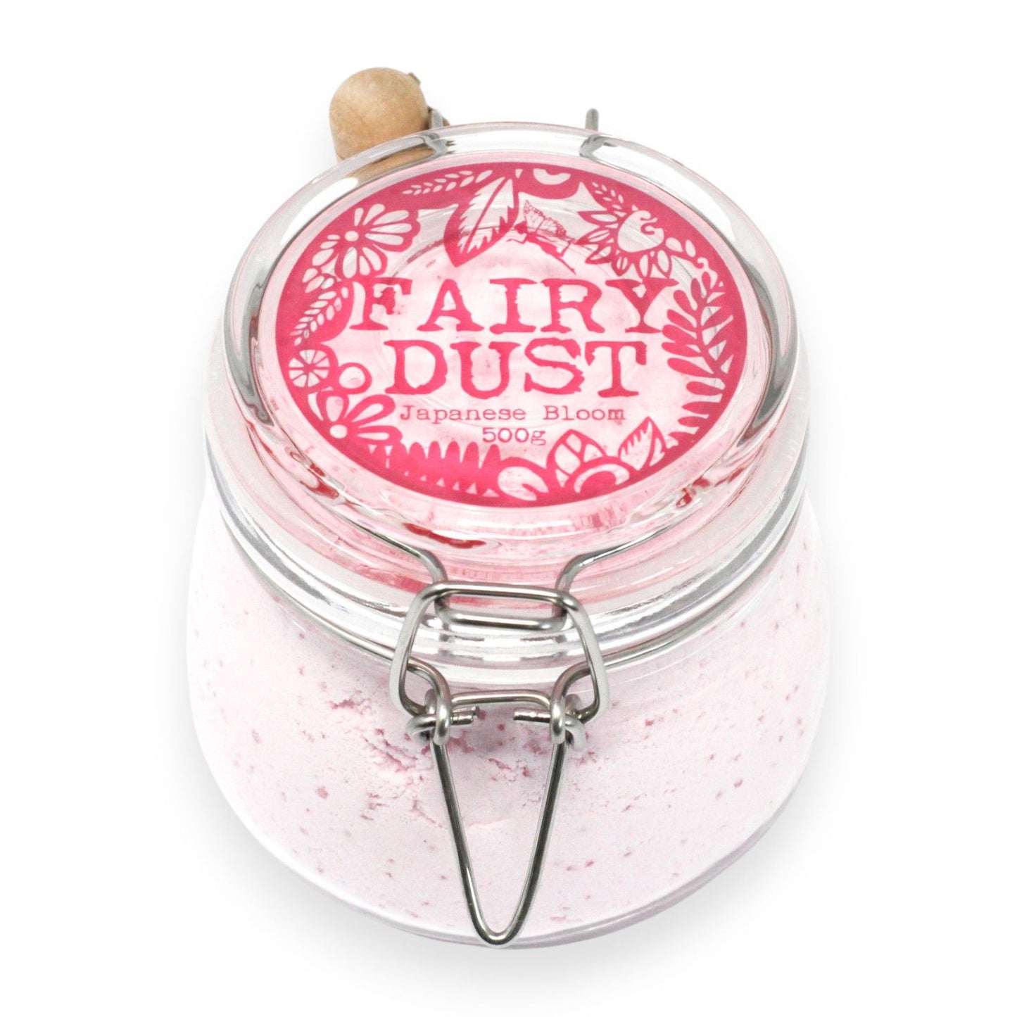Luxurious floral bath powder in a classic glass Kilner jar with a wooden scoop.