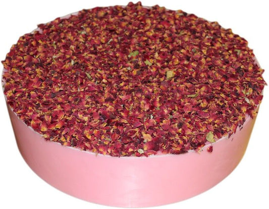 Large 10kg block of artisan soap infused with dried rose petals and a delicate pink hue.
