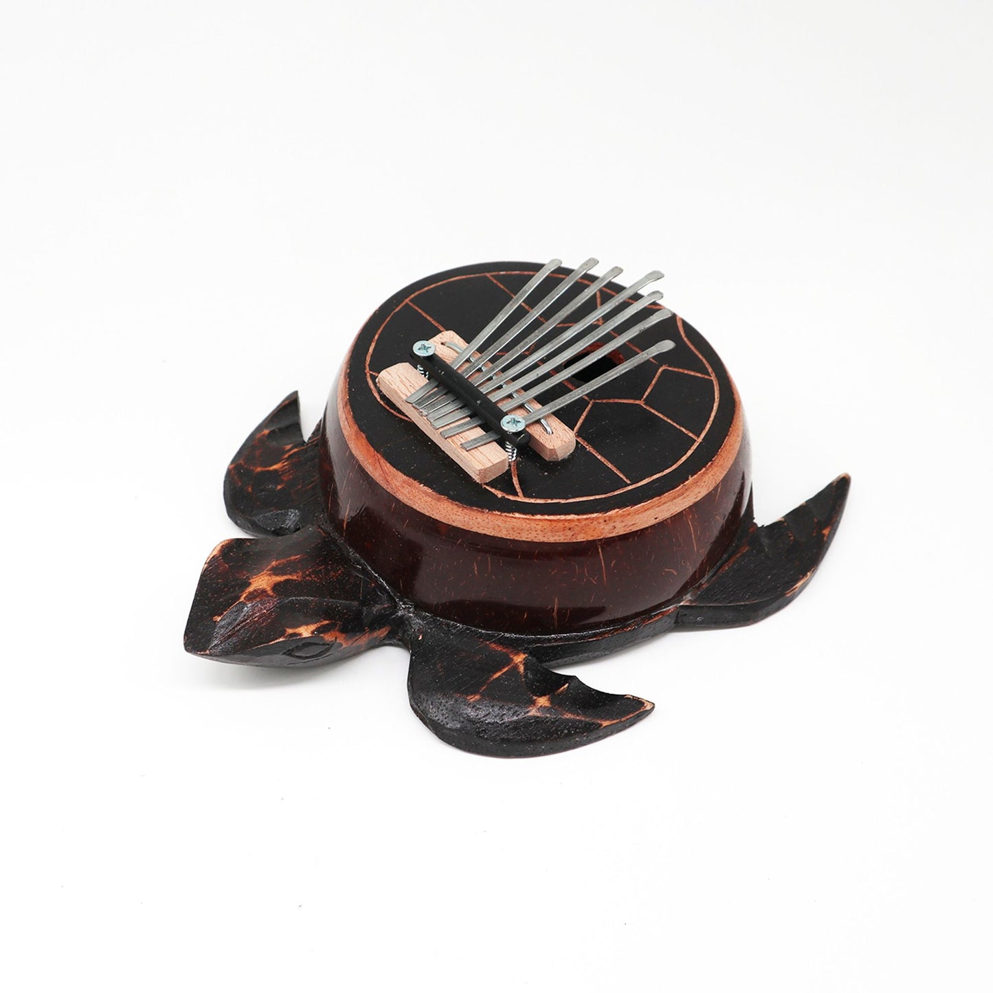 Hand-crafted kalimba thumb piano made from a real coconut shell with a decorative turtle design on the front.