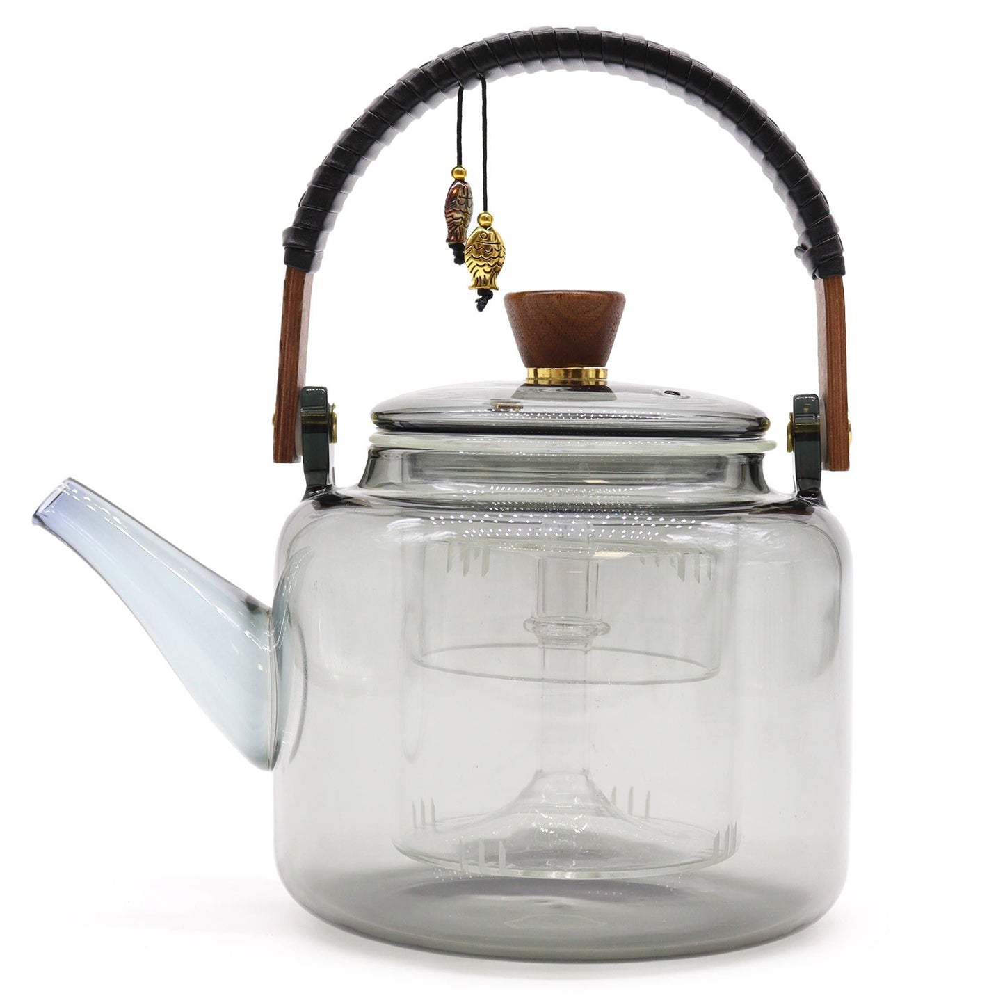 Large clear glass teapot with a sleek charcoal grey infuser and steamer system showing tea leaves steeping inside.