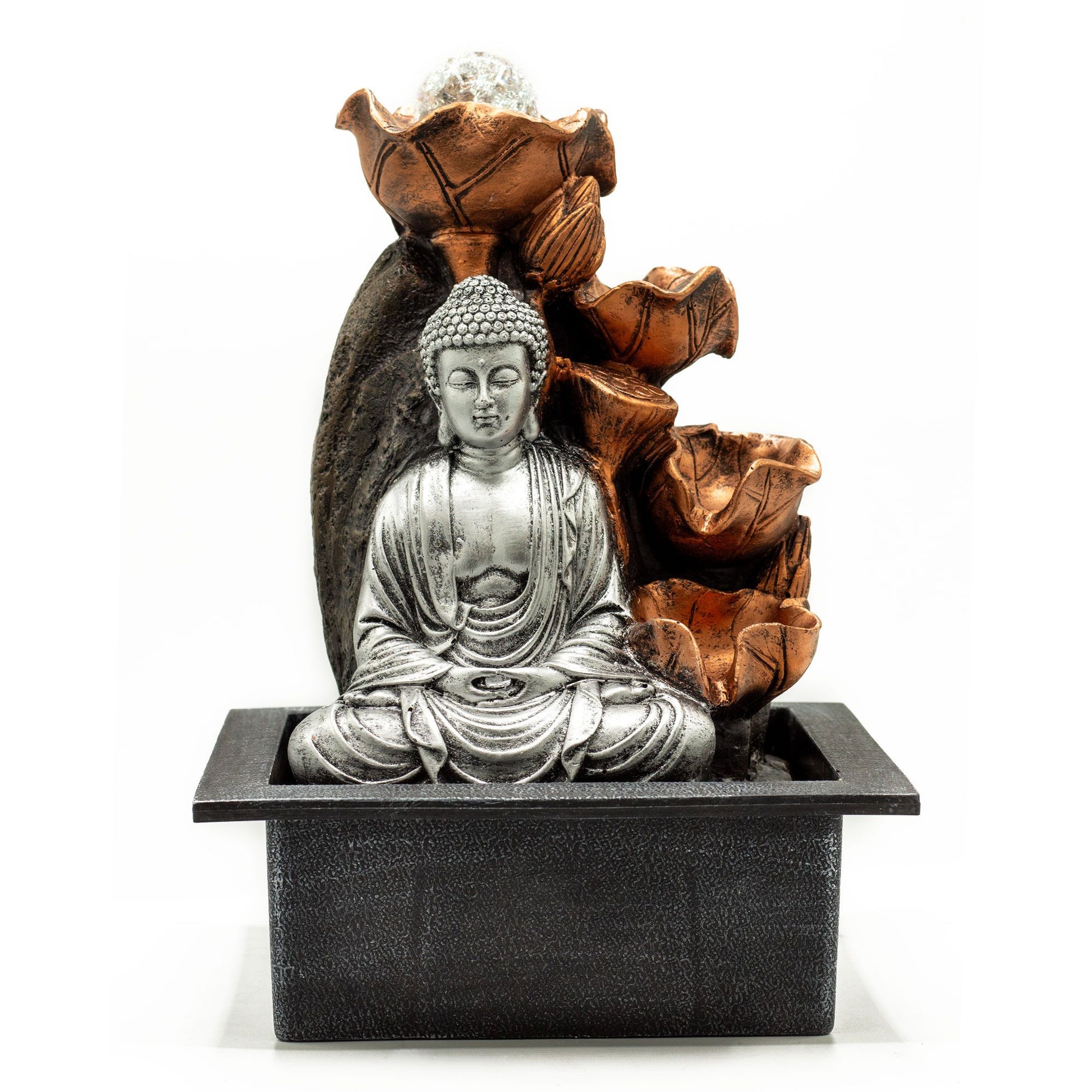 Serene silver Buddha statue seated beside a cascading water feature with a spinning crystal ball on a dark base.
