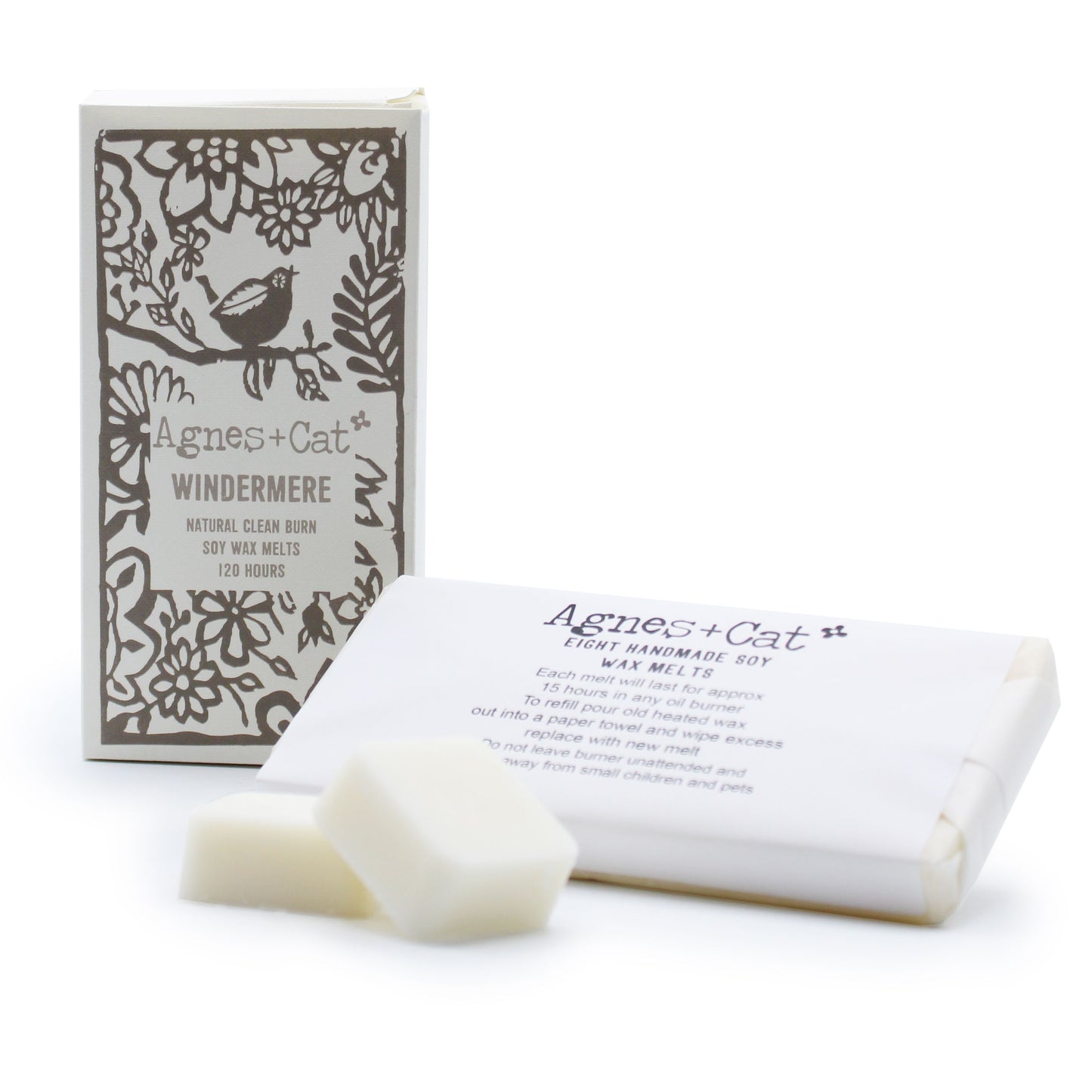 Crafted box containing eight natural soy wax melts with a fresh botanical scent for home fragrance.