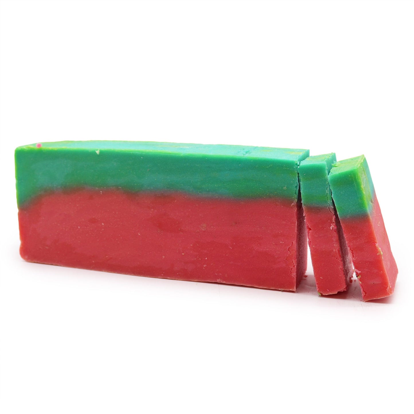 Large artisanal soap loaf with vibrant pink and green layers resembling a fresh watermelon slice.