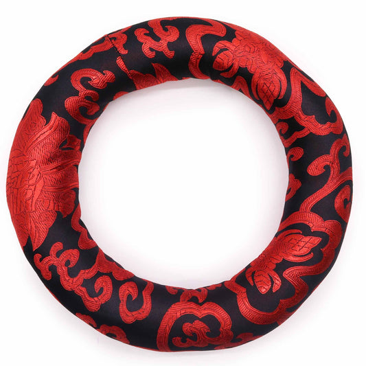 Round fabric hoop cushion for supporting Tibetan singing bowls, shown in a variety of vibrant assorted colours.