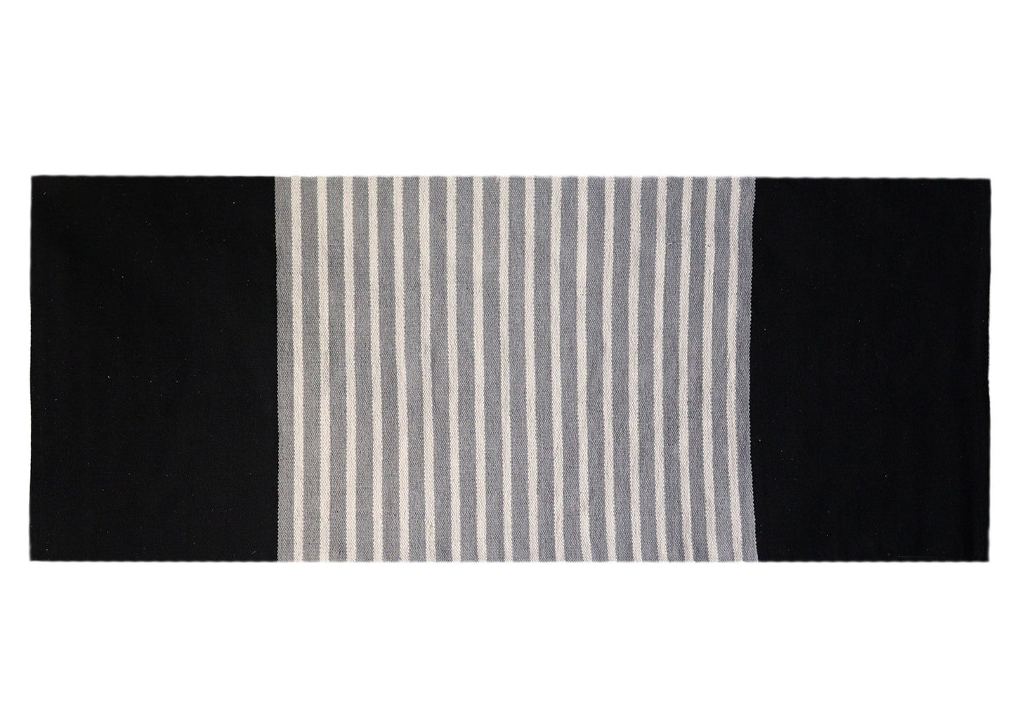 Hand-woven black and grey Indian cotton rug with a neutral pattern, sized perfectly for a hallway or yoga mat.