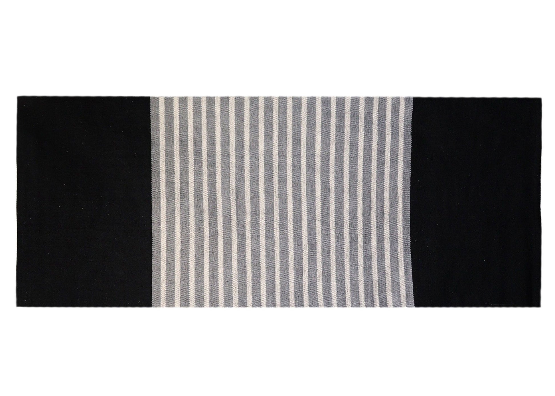 Hand-woven black and grey Indian cotton rug with a neutral pattern, sized perfectly for a hallway or yoga mat.