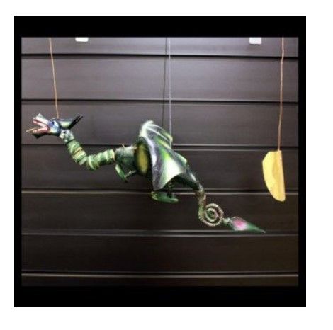 Large green handcrafted dragon hanging mobile made from coconut shell with a wide wingspan.