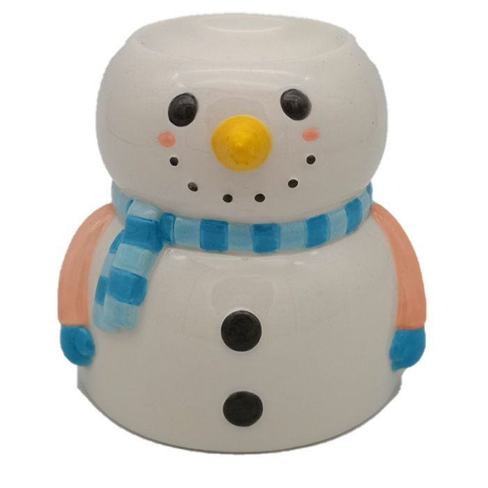 Festive white ceramic oil burner shaped like a smiling snowman with a black hat and red scarf detail.