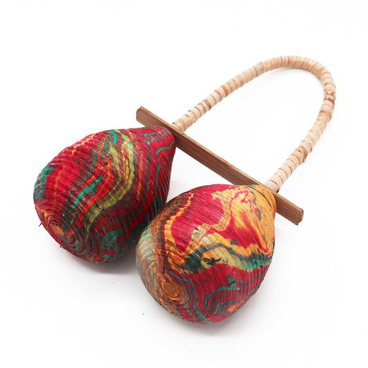Handcrafted rattan percussion instrument featuring a unique double-loop handle design and natural woven texture.