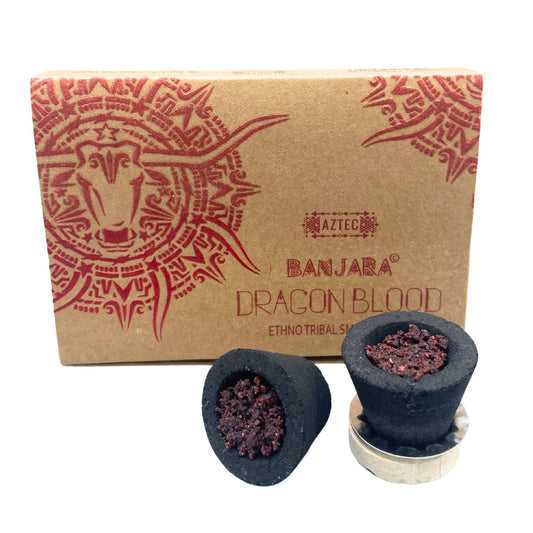 Handcrafted charcoal resin cups filled with deep red dragon's blood resin for spiritual smudging and incense rituals.