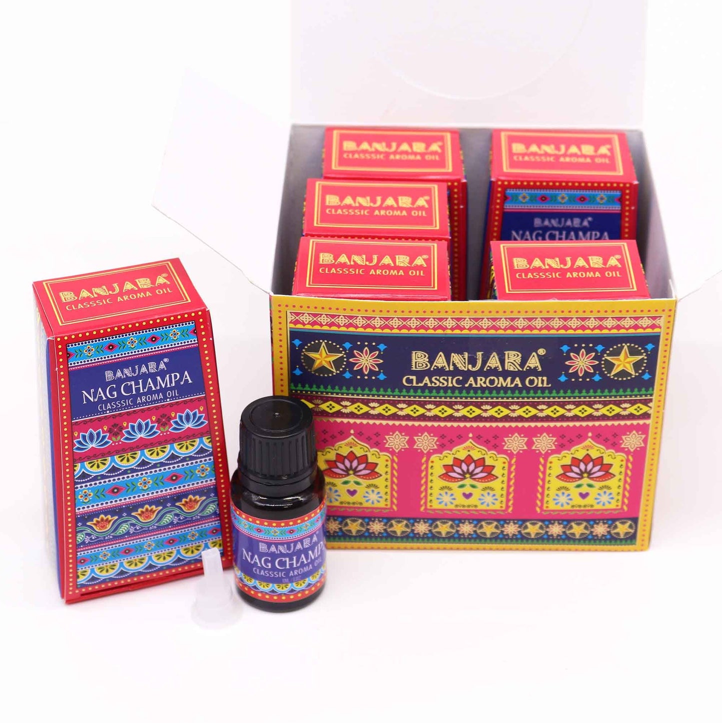 Small amber glass bottle of Nag Champa fragrance oil with a decorative label featuring traditional patterns.