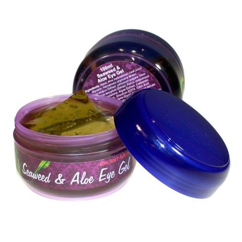 Clear soothing eye gel in a glass jar, showing a lightweight and refreshing texture for delicate skin care.